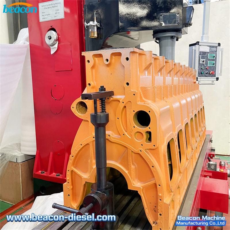 T2200 Portable Cylinder Boring Machine - engine block clamping fixture detail showing adjustable jaws and mounting mechanism for secure engine positioning during boring