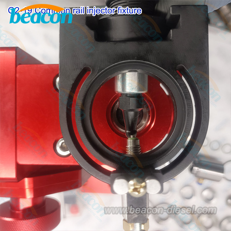 G2-19 common rail injector clamping fixture mounted on a test bench.