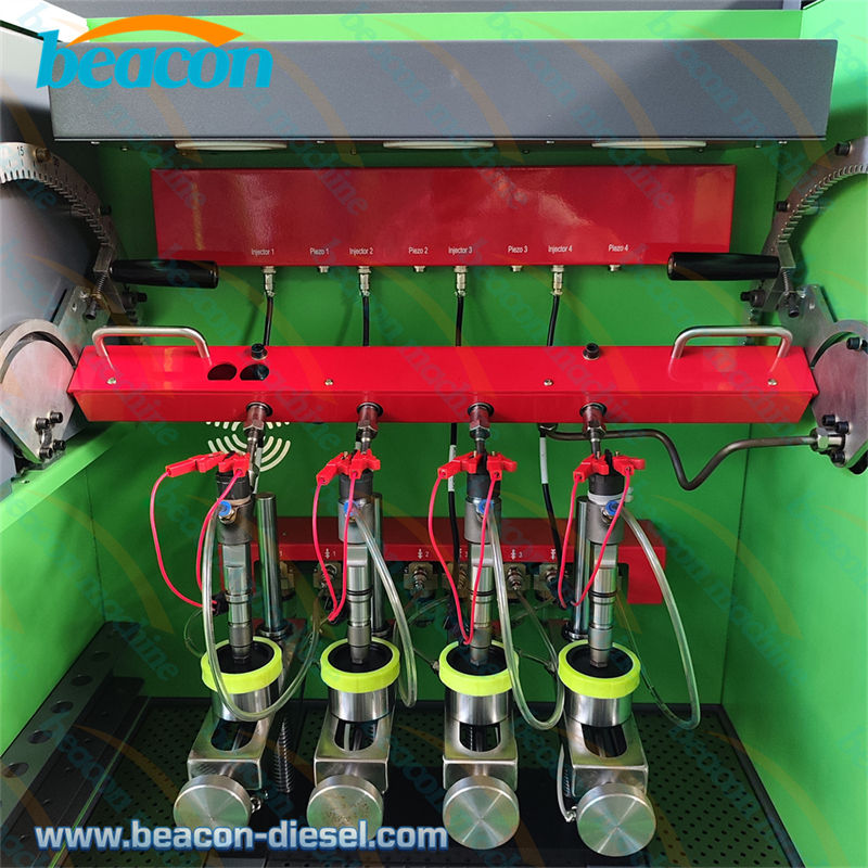 Close-up of 4 clamping fixtures and movable rail pipe mechanism.