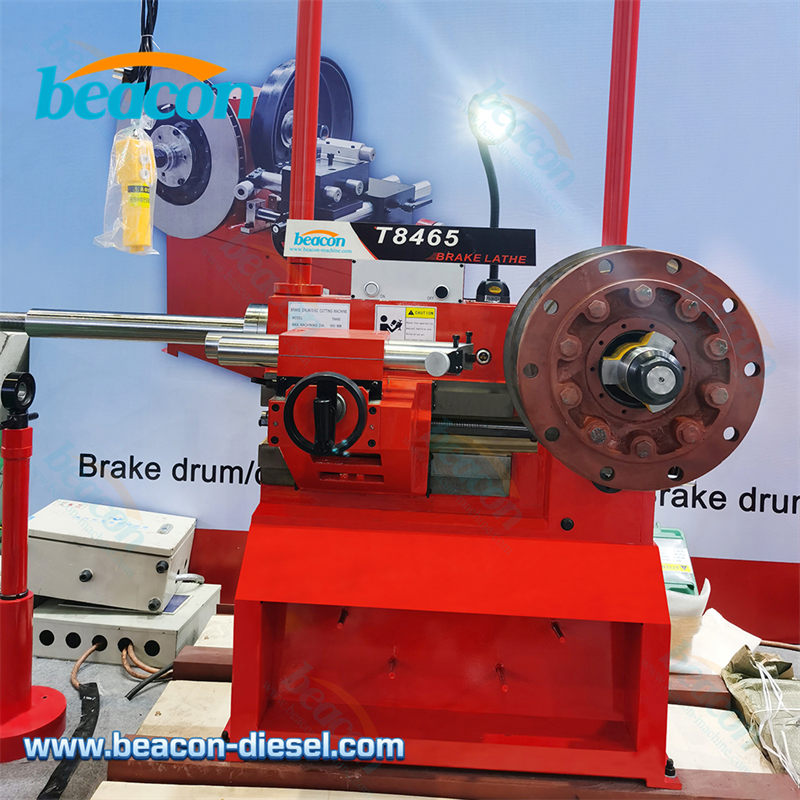 T8465 machine mounting a heavy brake drum for turning operation