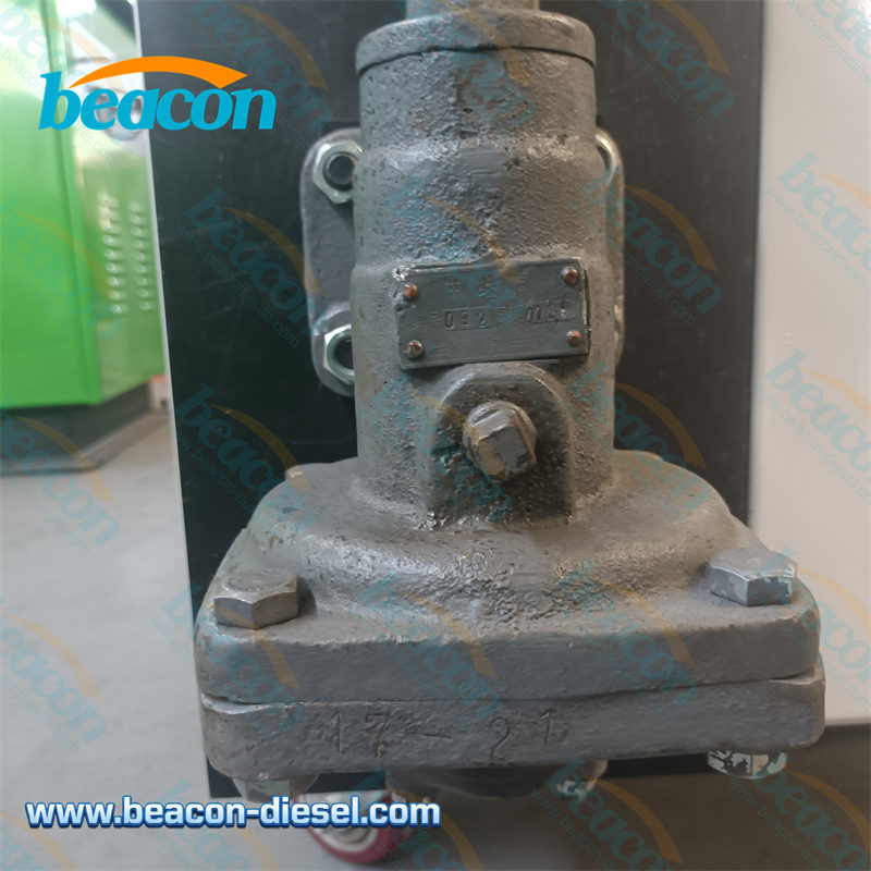  Close-up of valve mounting ports and manual clamps on TR-B bench