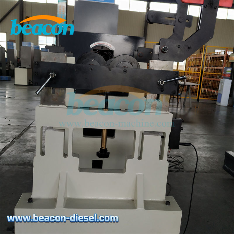 Side profile of the balancing machine showing HT250 cast iron bed