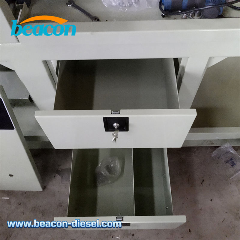 Dual storage drawers integrated into the Beacon 12PSD test bench for tool organization.