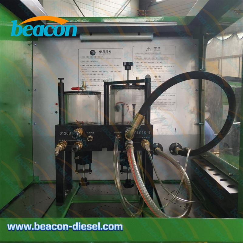 CR318 test bench work area setup for testing Caterpillar HEUI injectors with dual circuit oil and diesel connections